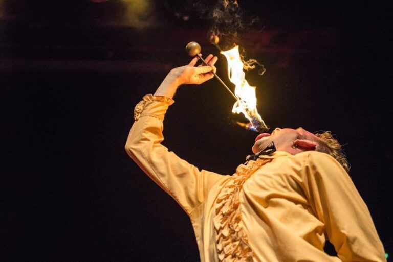 Fire breathing performer at an event